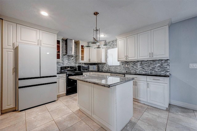 kitchen featuring a sink, black range with electric stovetop, light tile patterned floors, and wall chimney range hood