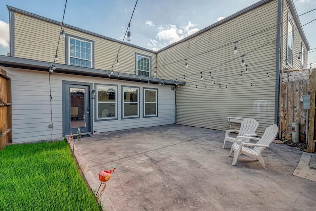 rear view of property with a patio area