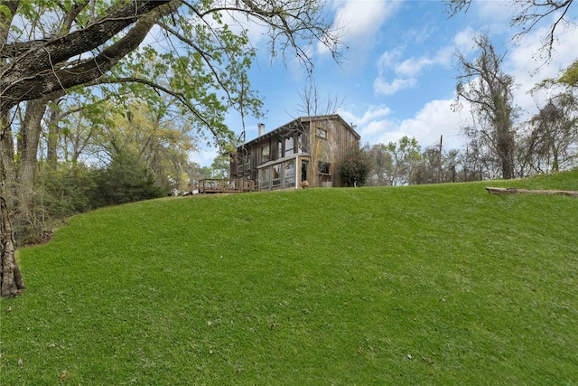 view of yard featuring a wooden deck