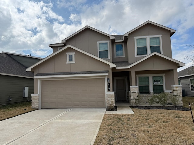 craftsman-style house with a garage and a front yard