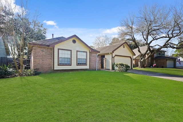 view of front of home with driveway, brick siding, a front lawn, and fence