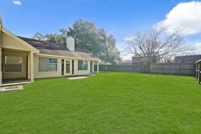 view of yard featuring a fenced backyard