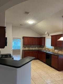 kitchen with tasteful backsplash, vaulted ceiling, dishwasher, kitchen peninsula, and pendant lighting