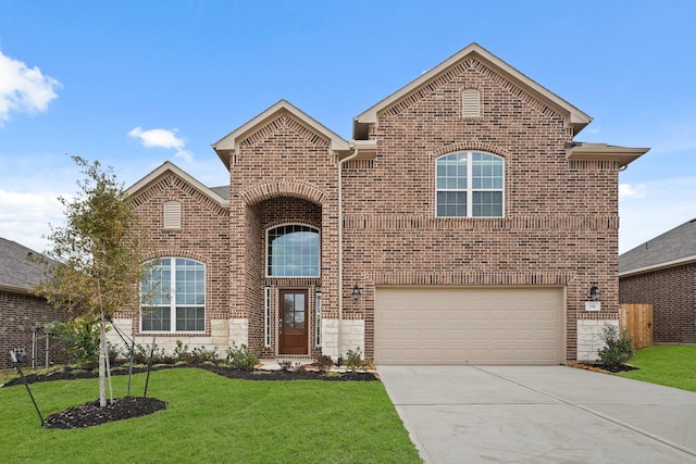 view of front facade featuring a garage and a front lawn