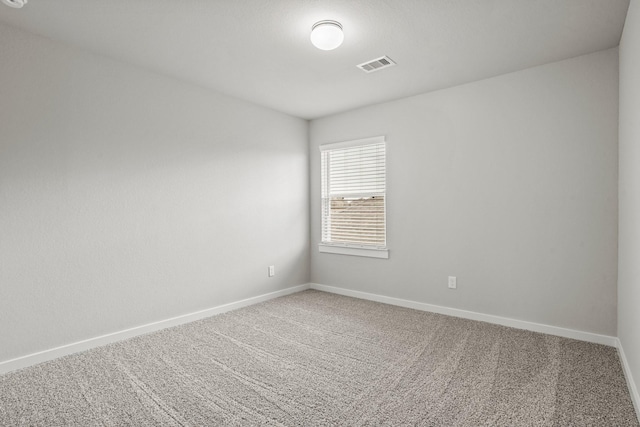 spare room with carpet