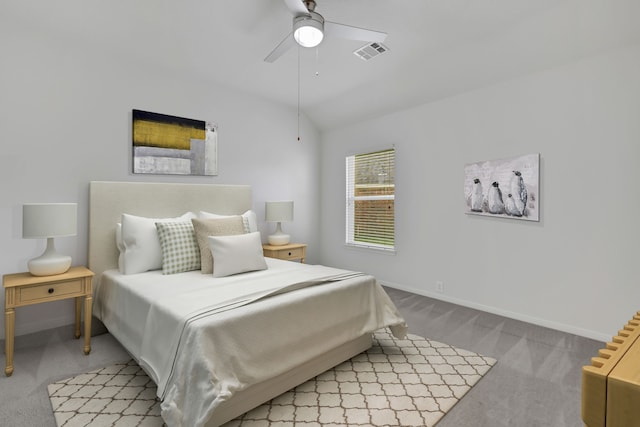 19110 Kelly Oaks Ct, Humble, TX 77346 - bedroom with visible vents, light carpet, baseboards, ceiling fan, and vaulted ceiling