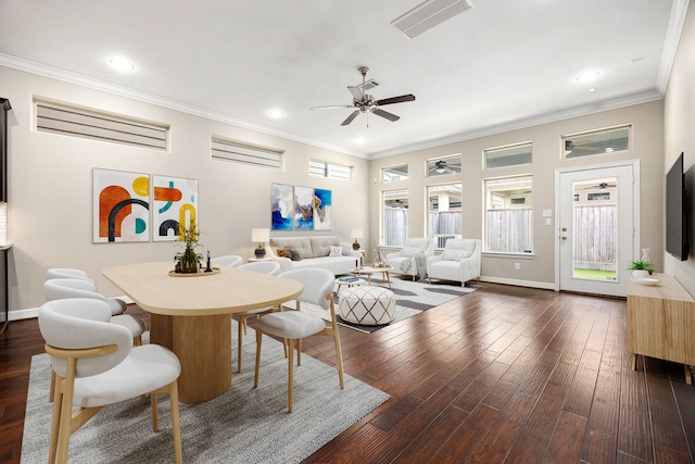 living room featuring ceiling fan, ornamental molding, and dark hardwood / wood-style flooring