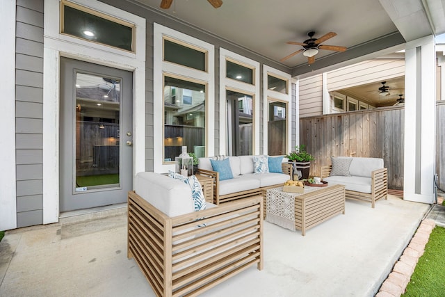 view of patio with outdoor lounge area and ceiling fan