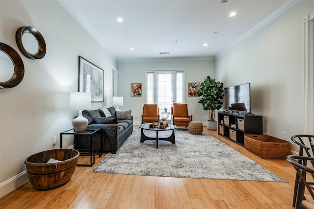 living room with crown molding and wood-type flooring