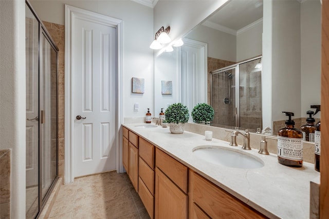 bathroom featuring crown molding, vanity, and walk in shower