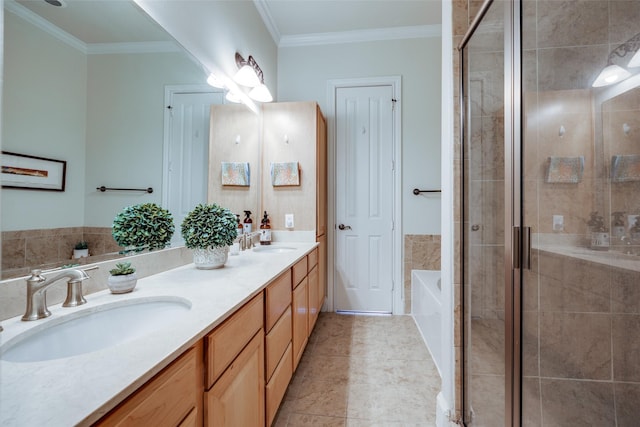 bathroom featuring crown molding, vanity, and independent shower and bath