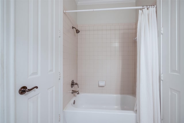 bathroom featuring shower / tub combo with curtain