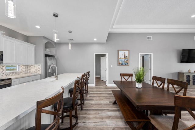 dining room featuring light hardwood / wood-style floors