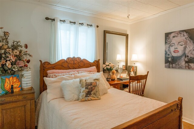 bedroom with crown molding