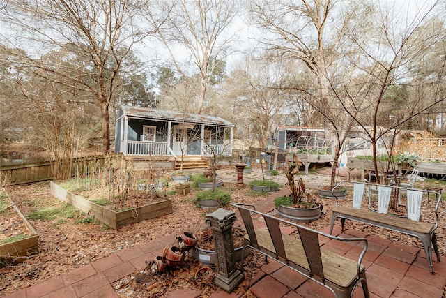 view of patio with an outdoor structure