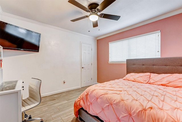 bedroom featuring ceiling fan, ornamental molding, and light wood-type flooring