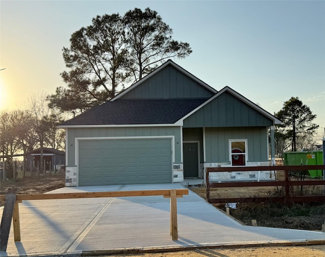 view of front of home with a garage