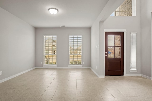 entrance foyer with light tile patterned flooring