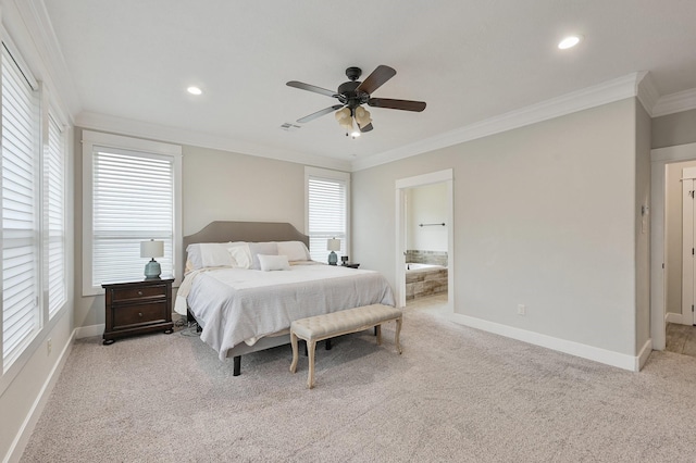 bedroom with ornamental molding, light colored carpet, and ensuite bathroom