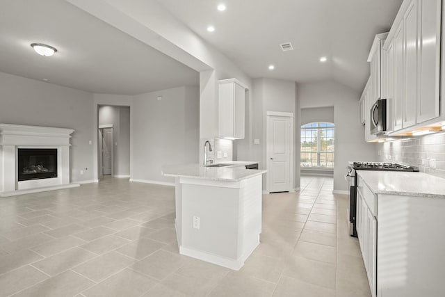 kitchen with white cabinetry, appliances with stainless steel finishes, and sink