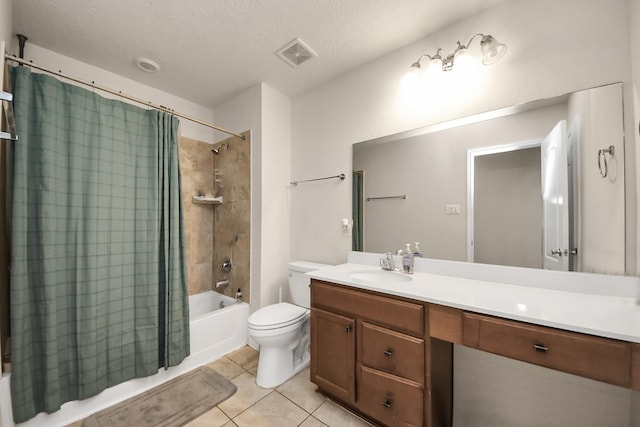 full bathroom with shower / tub combo with curtain, tile patterned flooring, vanity, a textured ceiling, and toilet