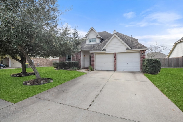 view of front of home featuring a garage and a front yard