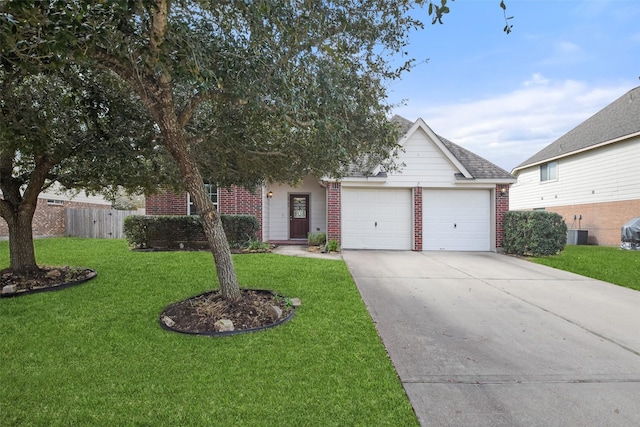 view of front facade with a garage, central AC unit, and a front yard