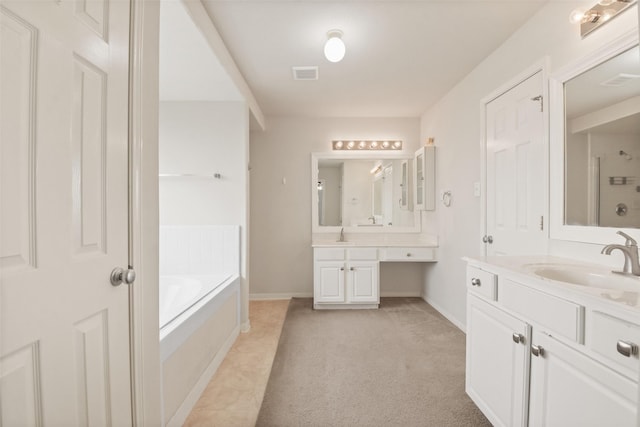 bathroom featuring vanity and a bathtub