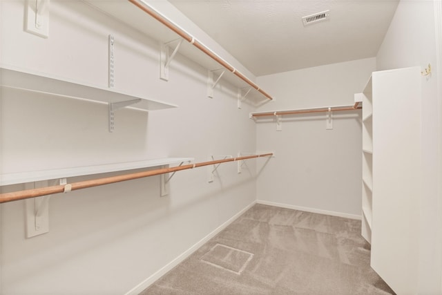 3706 Trent Cove Ln, Pearland, TX 77584 - walk in closet featuring light carpet
