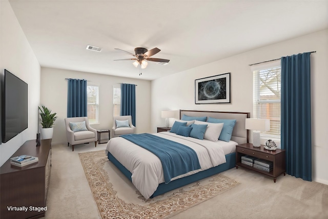 3706 Trent Cove Ln, Pearland, TX 77584 - carpeted bedroom with multiple windows and ceiling fan