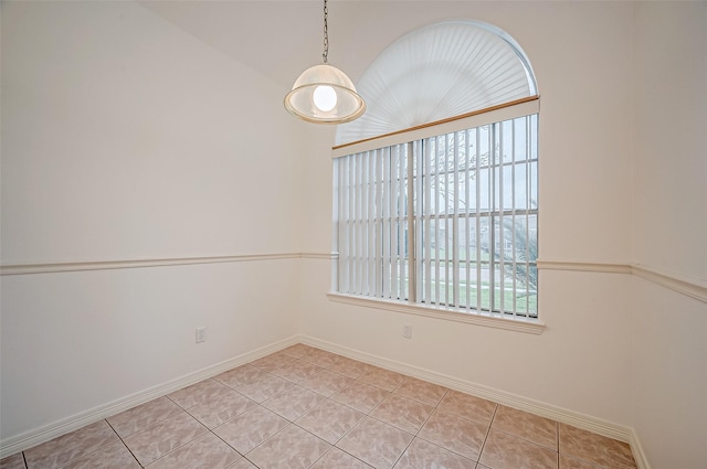 empty room featuring light tile patterned floors