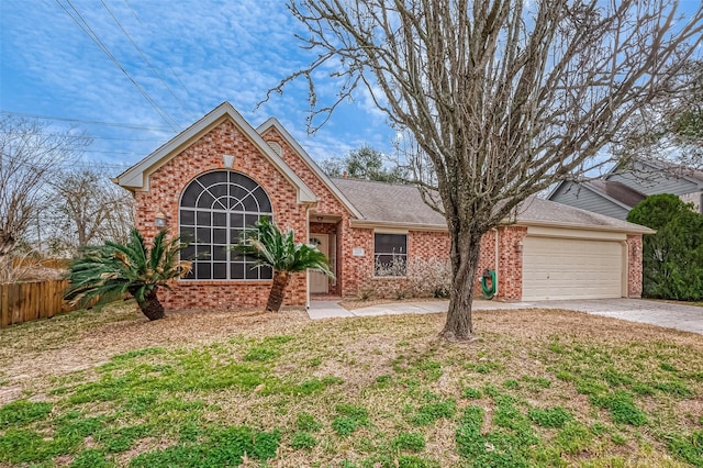 view of front property featuring a garage and a front yard