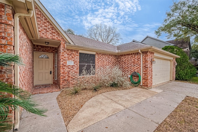 entrance to property with a garage