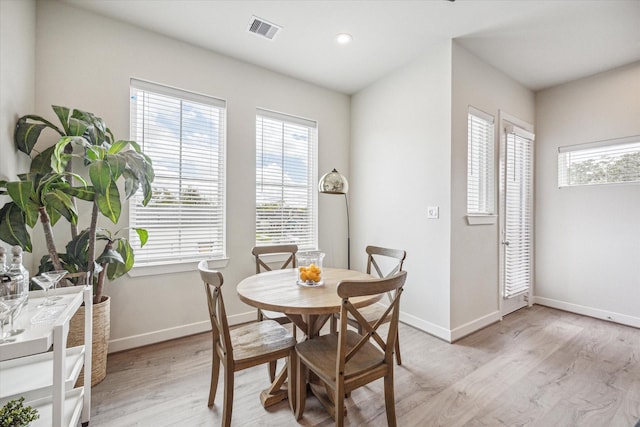 dining area with light wood-type flooring