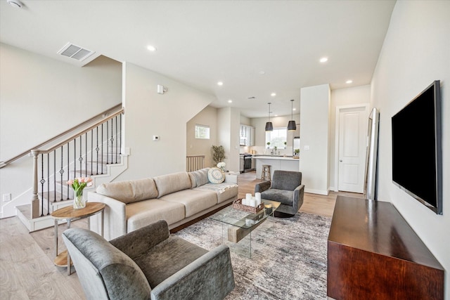 living room featuring light hardwood / wood-style flooring