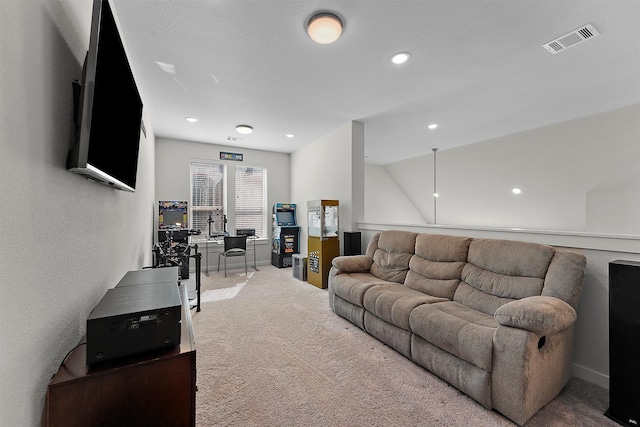 carpeted living room with vaulted ceiling