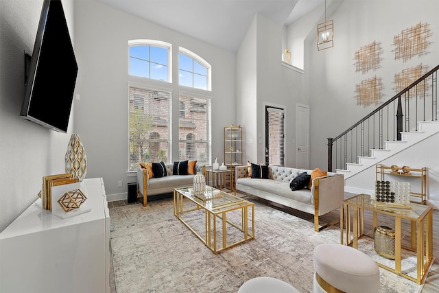 living room with a high ceiling