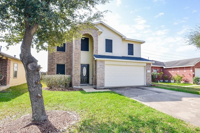 view of front of home featuring a garage and a front yard