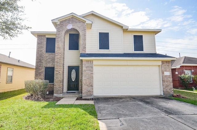 view of front facade featuring a garage and a front lawn