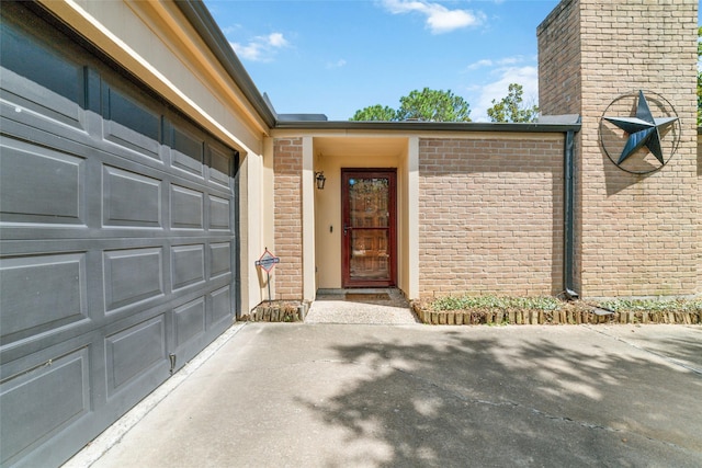 entrance to property with a garage