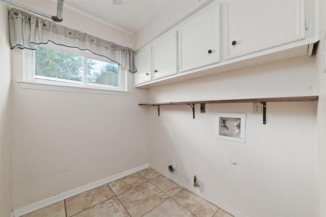 laundry area featuring cabinets, light tile patterned floors, hookup for a washing machine, hookup for an electric dryer, and hookup for a gas dryer