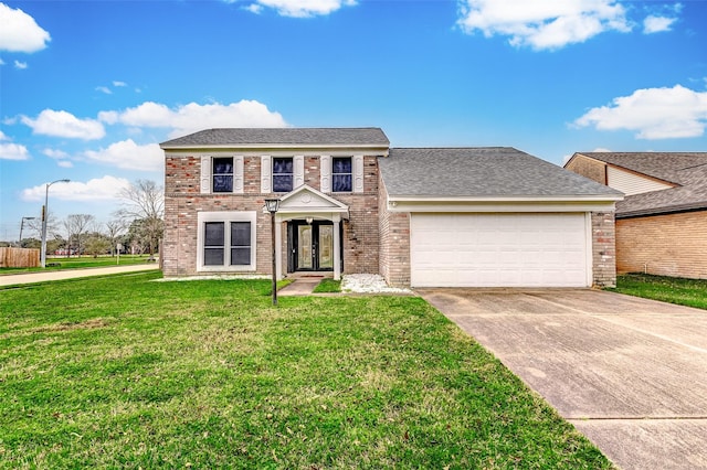 view of front of home with a garage, a front yard, and french doors