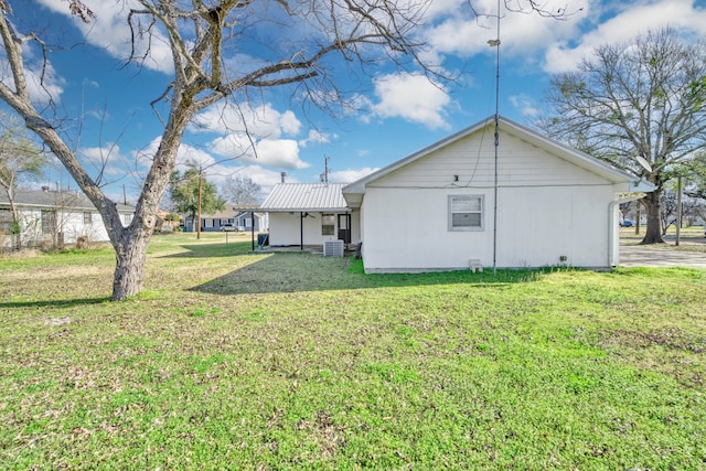 exterior space with a lawn