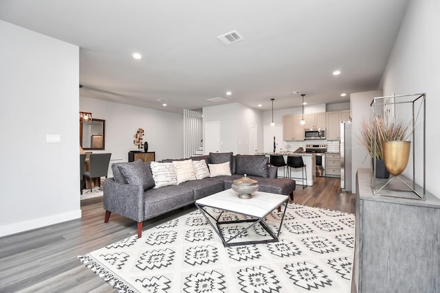 living room with hardwood / wood-style flooring