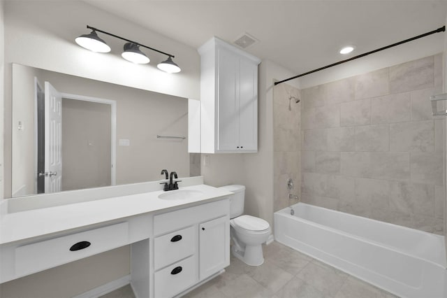 bathroom featuring toilet, vanity, visible vents, and shower / bathing tub combination