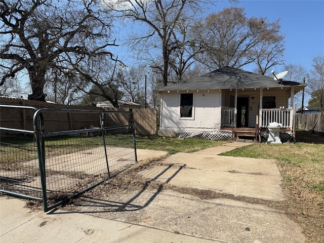 back of house with covered porch