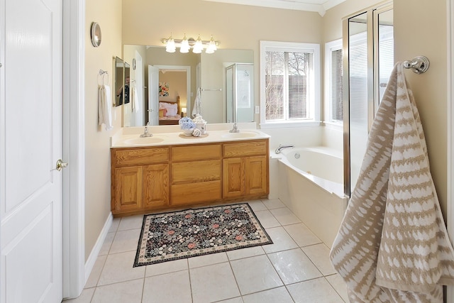 bathroom featuring vanity, shower with separate bathtub, and tile patterned flooring