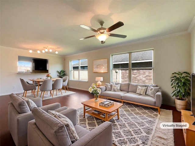 living room with crown molding, hardwood / wood-style floors, and ceiling fan