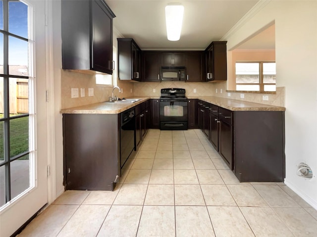 kitchen with sink, black appliances, dark brown cabinets, light tile patterned floors, and backsplash