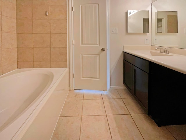 bathroom featuring tile patterned flooring and vanity